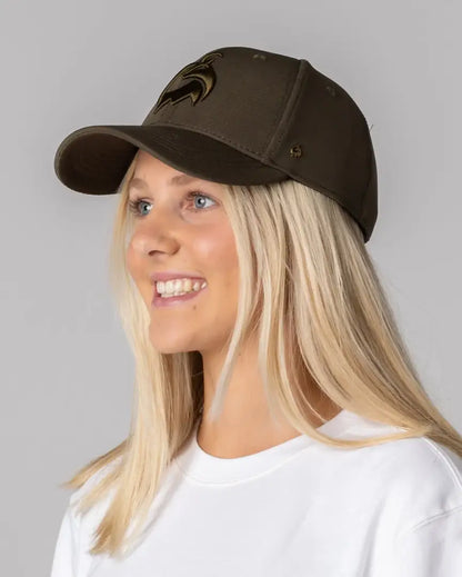 Bushbuck Workmans Snapback Cap: brown cap with black logo on white sweatshirt for hunting outdoors
