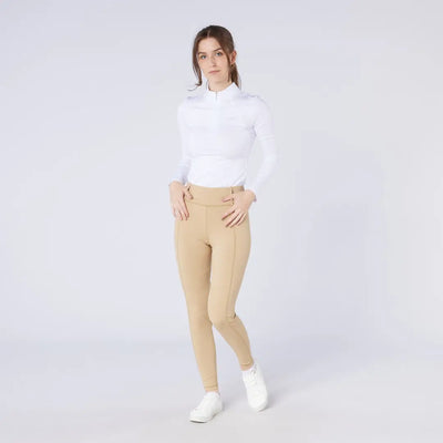 Young woman in white top and tan leggings wearing Cameo All Season Tights for country clothing