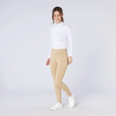 Woman in beige high-waisted skinny pants wearing Cameo All Season Tights, perfect for country clothing and hunting