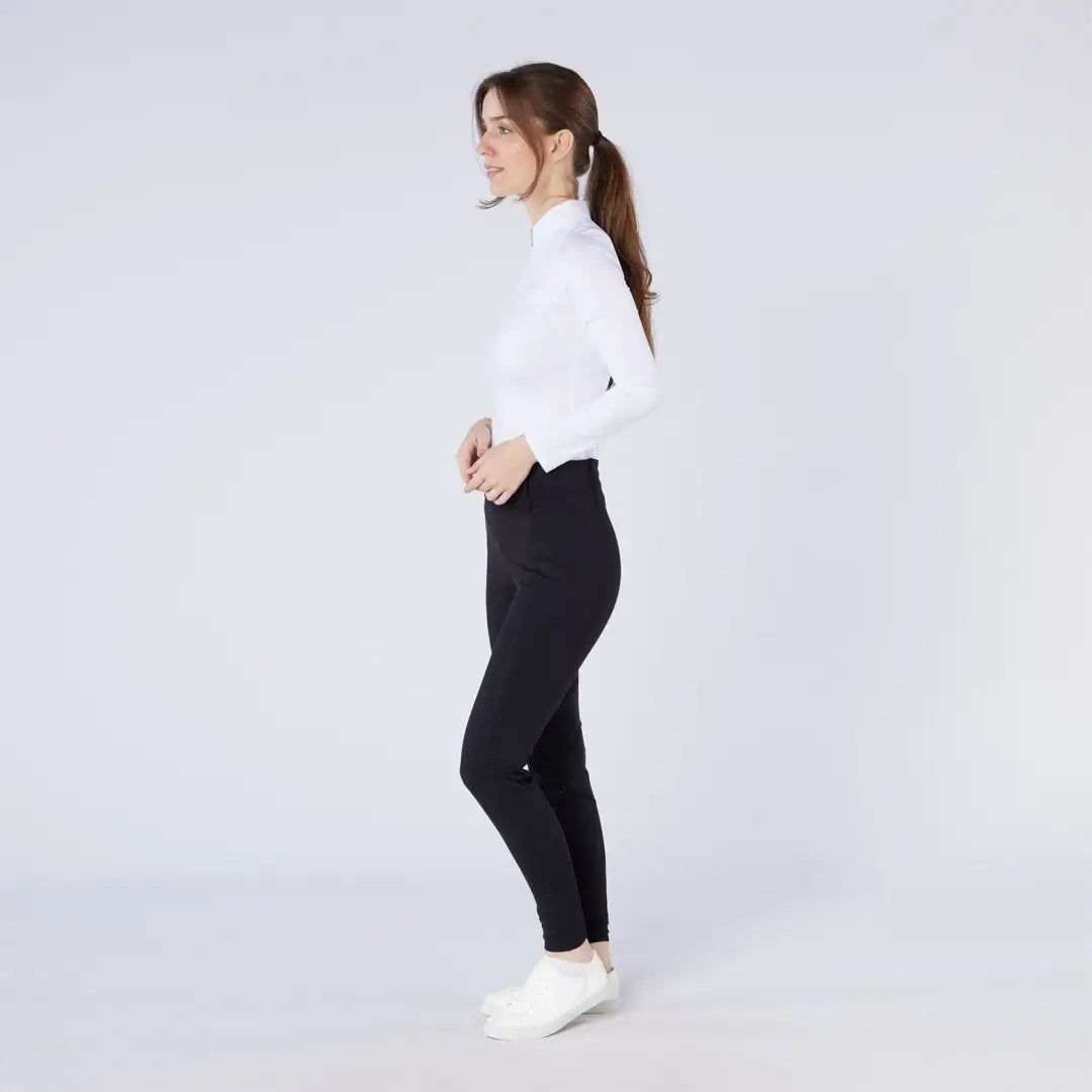 Women’s white long-sleeved turtleneck and black season tights for country clothing and hunting