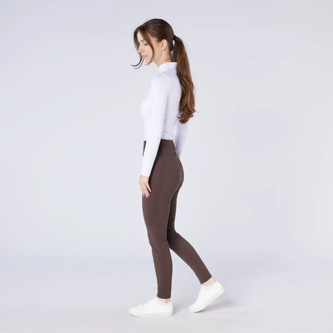 Woman in white top and brown leggings wearing Cameo All Season Tights for country clothing
