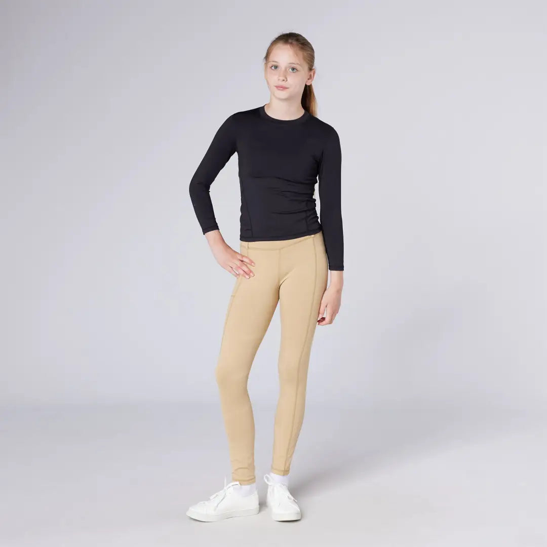 Girl wearing Cameo Junior All Season Riding Tights in country clothing and hunting style