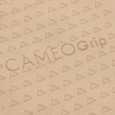 Cameo Junior Core tights with textured beige surface and repeating triangle pattern