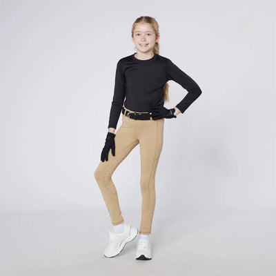 Girl in stylish Cameo Junior Performance Riding Tights for comfortable riding performance
