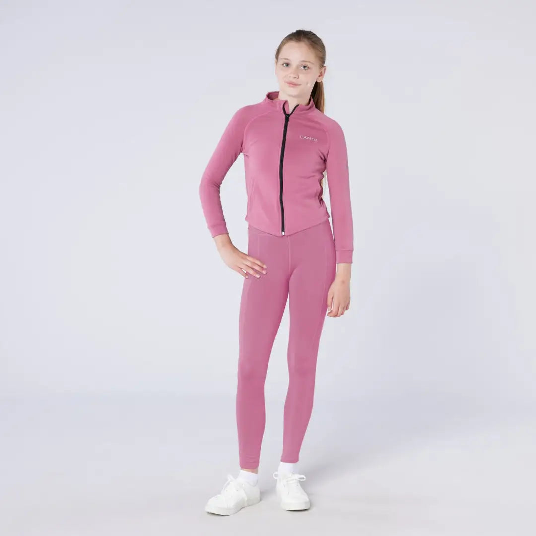 Cameo Junior pink zip-up tracksuit with black zipper and white sneakers