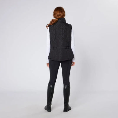 Woman in black quilted vest with Cameo Performance Tights, perfect for riding tights