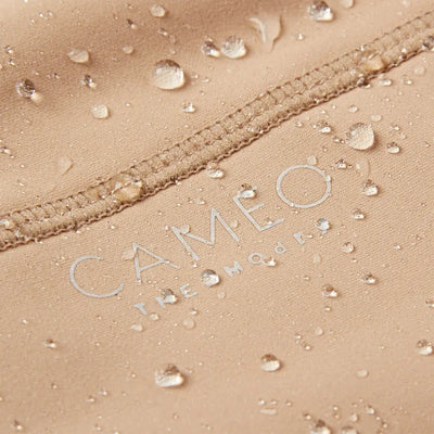 Water-resistant fabric with visible stitching on Cameo ThermoDry Riding Tight for country clothing outdoors