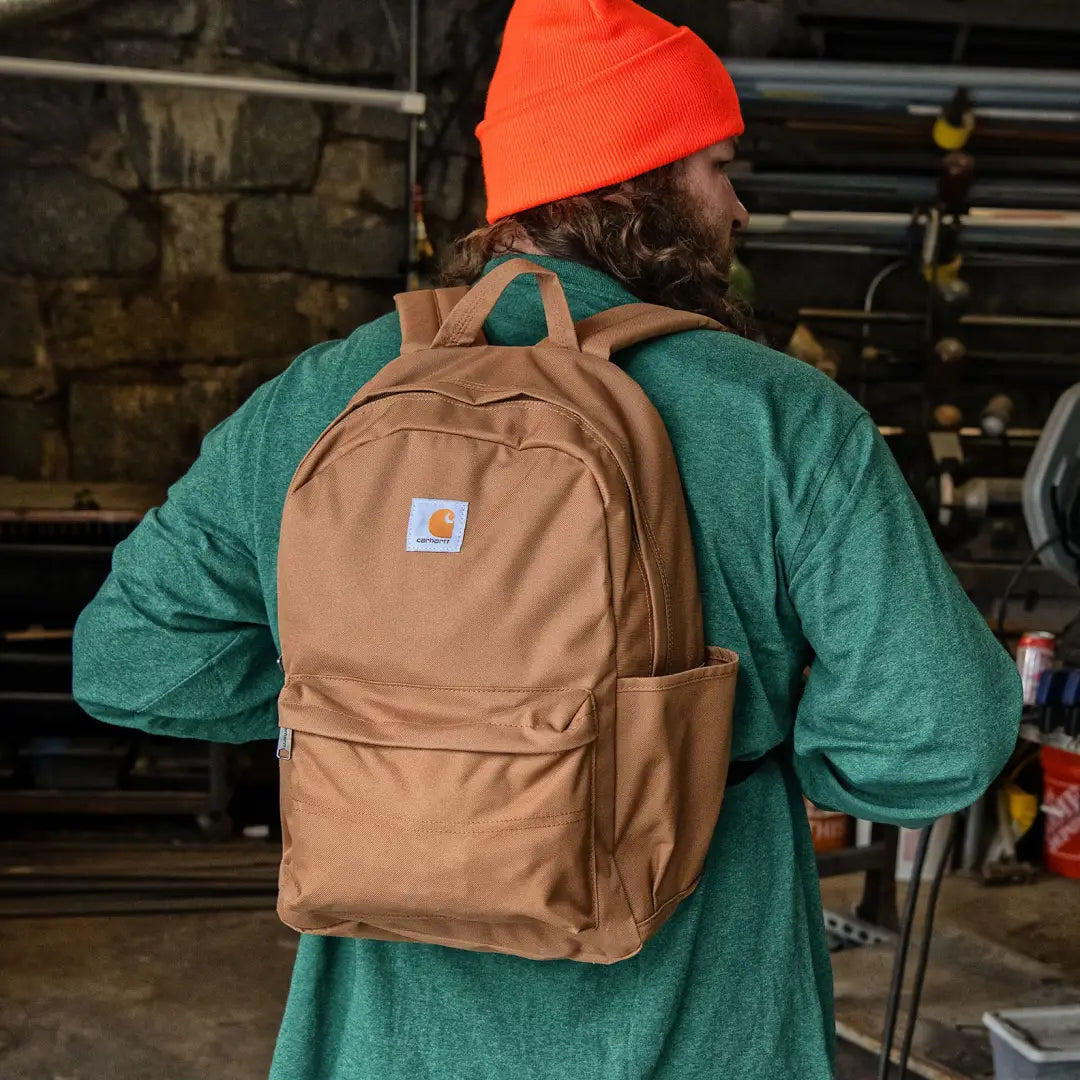 Brown Carhartt backpack perfect for country clothing, hunting, and outdoor adventures