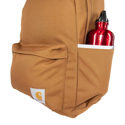 Brown Carhartt 21L Classic Laptop Backpack with red water bottle for country clothing and outdoors adventures