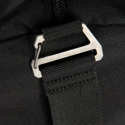 Black nylon strap with silver buckle on Carhartt 40L Classic duffel