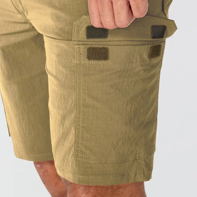 Carhartt Force olive green cargo shorts with utility pockets and velcro patches