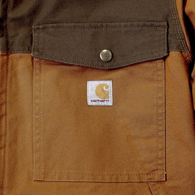 Brown Carhartt pocket on Montana Rugged Flex relaxed fit jacket for country hunting style