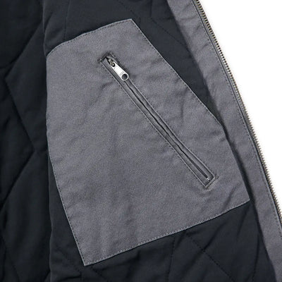 Gray jacket interior with zippered pocket from Carhartt Montana Rugged Flex relaxed fit duck vest for country clothing and hunting