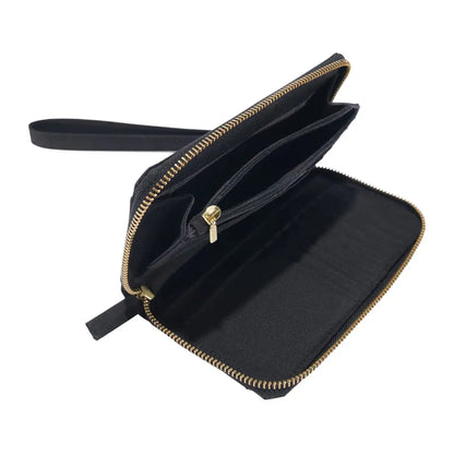 Open black clutch wallet with gold zipper from Carhartt Nylon Duck for country clothing and hunting
