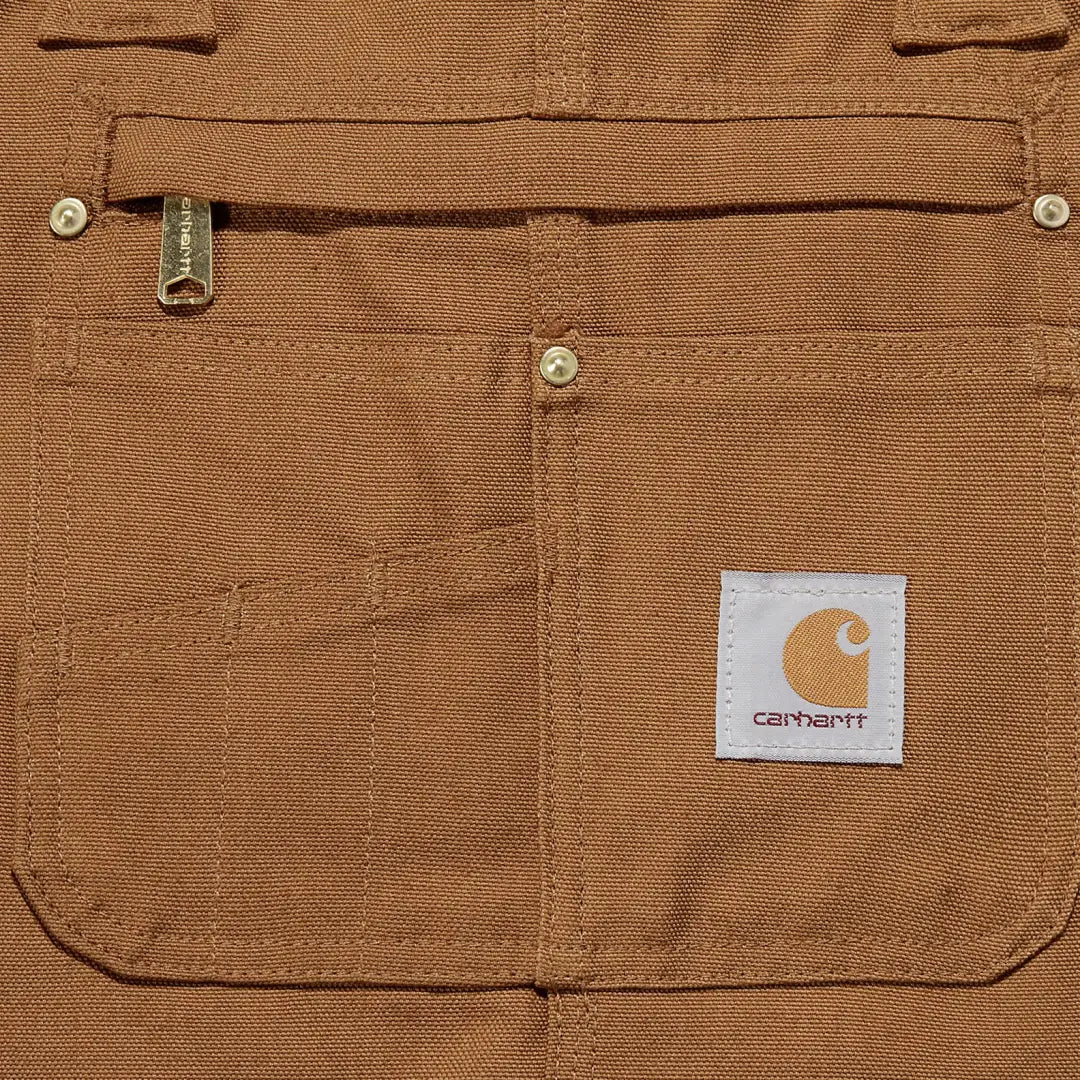 Brown Carhartt workwear pocket on relaxed fit duck bib overall for country clothing outdoors