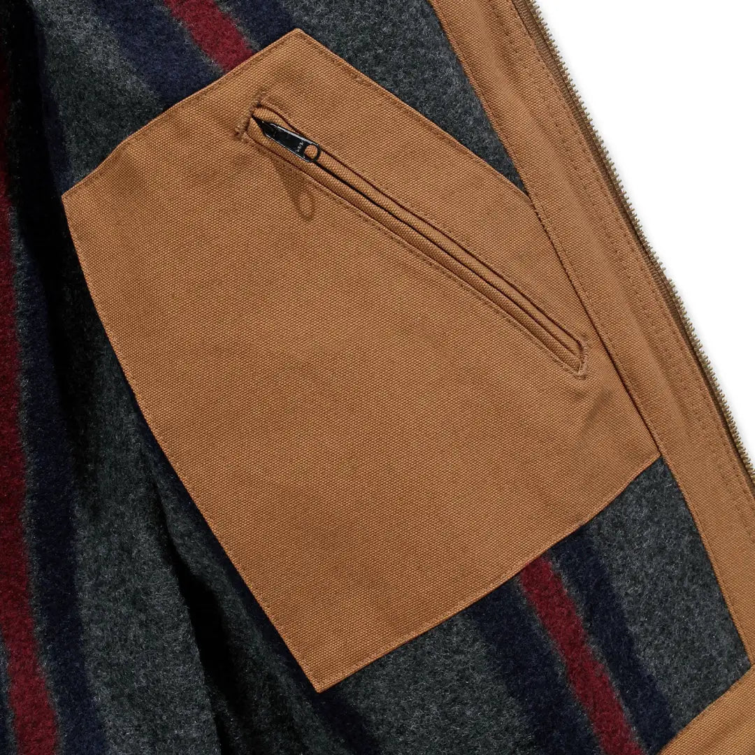 Carhartt relaxed fit Detroit jacket with brown corduroy zip pocket on striped sweater