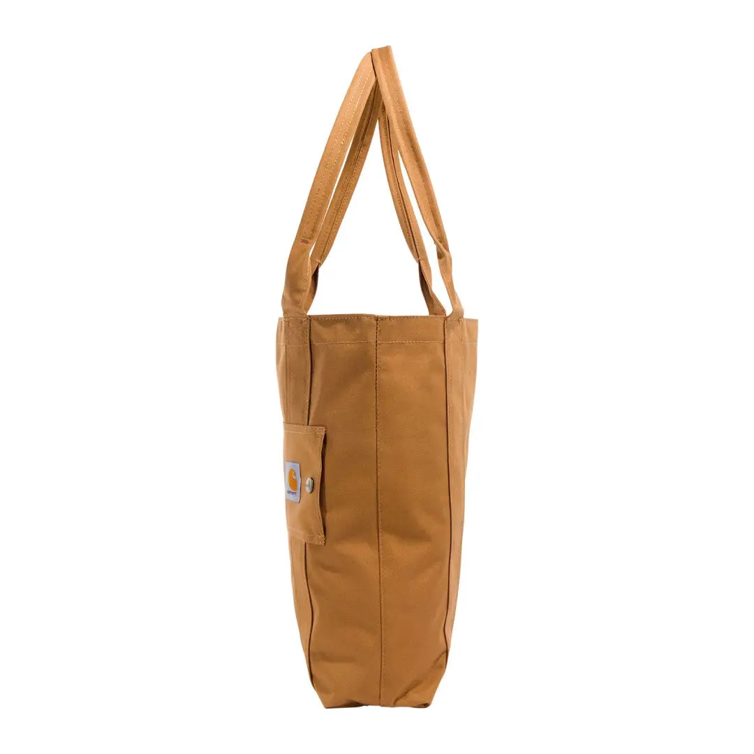 Carhartt vertical open tote bag in brown canvas with leather handles and front pocket