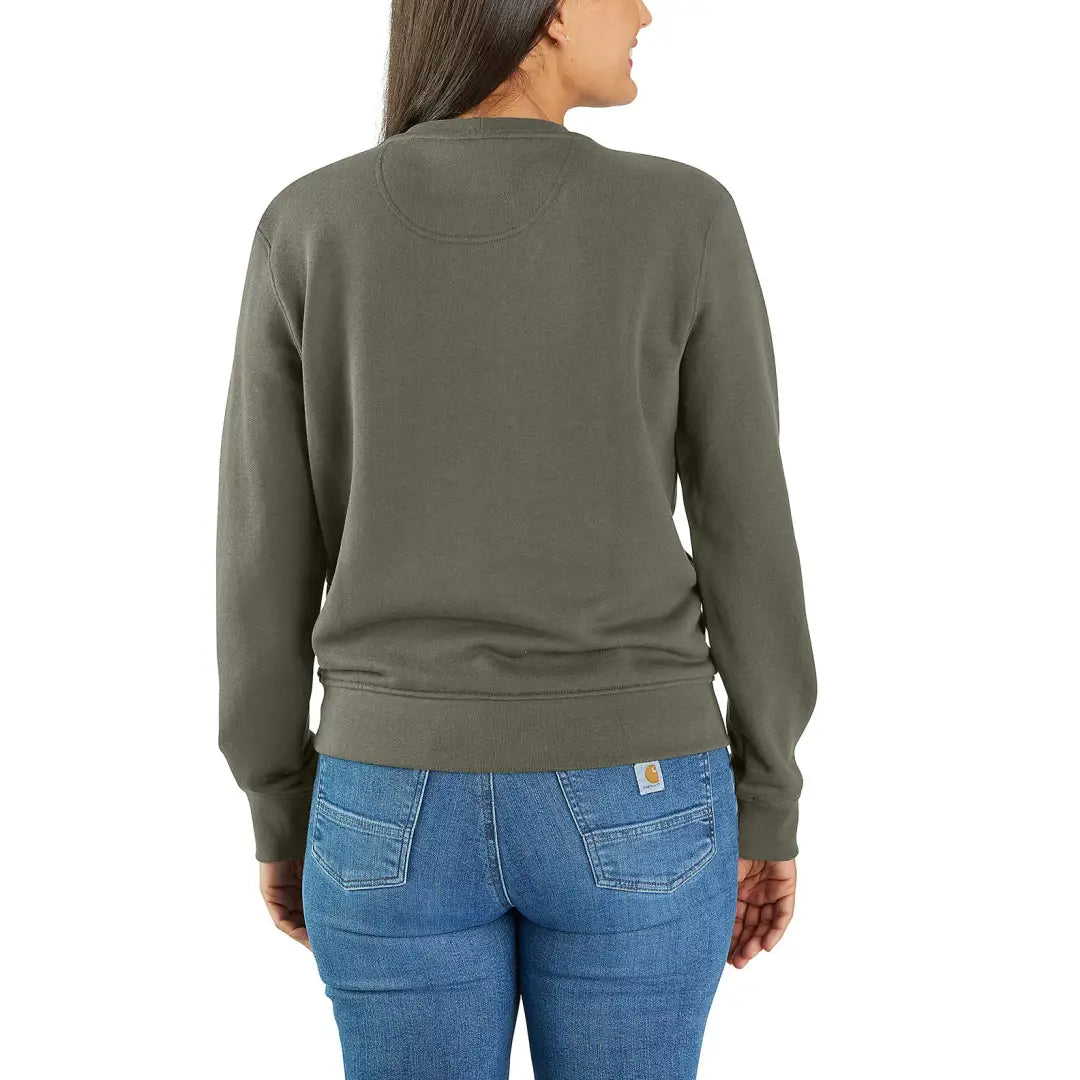 Olive green Carhartt relaxed fit french terry crewneck sweatshirt with blue jeans for country clothing