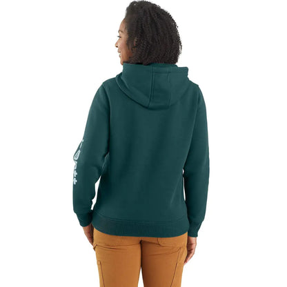 Woman wearing relaxed fit green hoodie from Carhartt country clothing, perfect for hunting