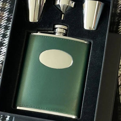 Green leather hip flask with silver accents, David Nickerson country clothing set