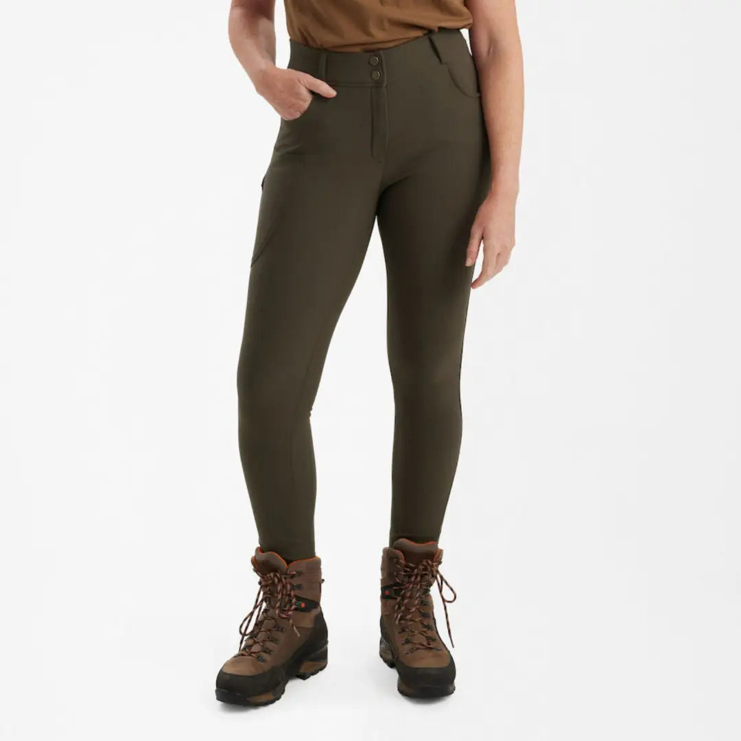 Deerhunter Lady Hunting Tights in olive green with brown hiking boots for women