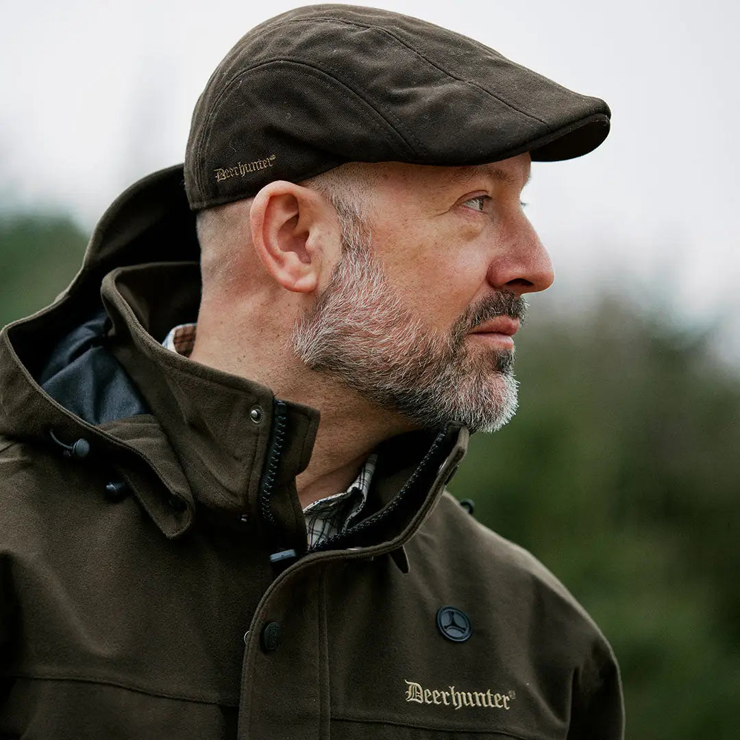 Brown flat cap and jacket from Deerhunter Pro Gamekeeper, perfect for country clothing and hunting