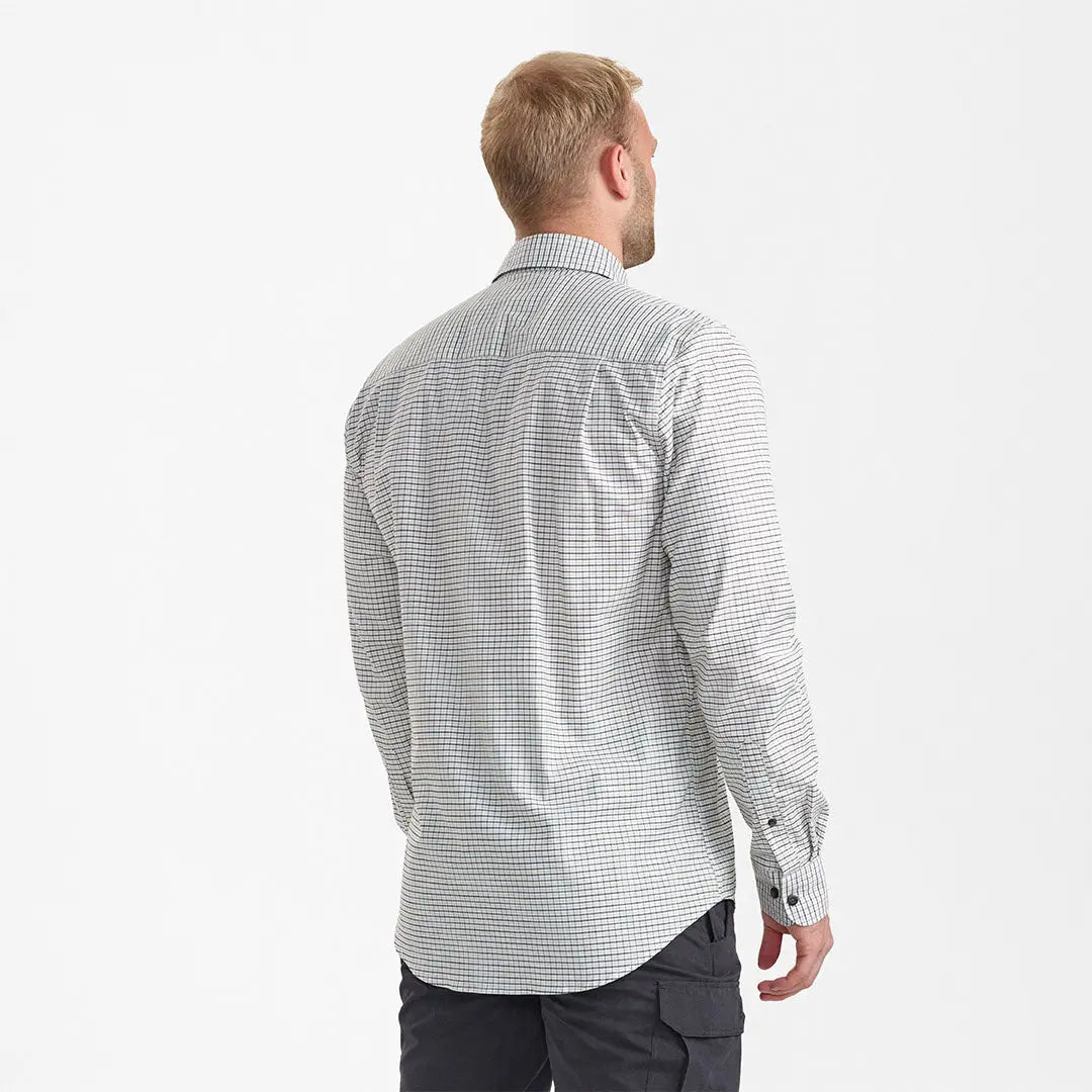 Man wearing Deerhunter Samuel Shirt with hidden button-down, chest pocket, stretchable fabric