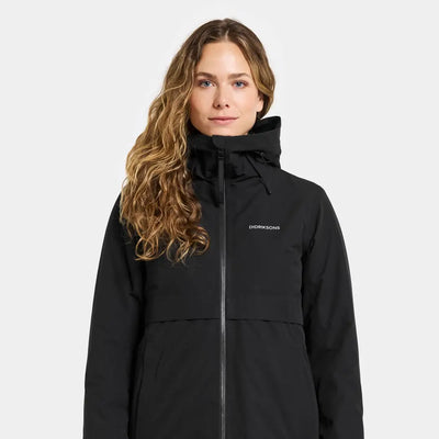 Woman in black waterproof jacket with hood, perfect for country clothing and outdoors adventures