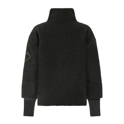 Black turtleneck sweater with ribbed cuffs perfect for autumn’s crisp winds