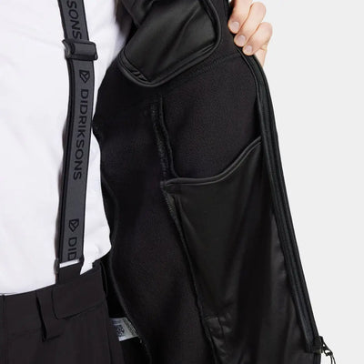 Open Didriksons Phoenix Fleece Jacket showing internal pockets and suspender strap for country clothing and outdoor activities