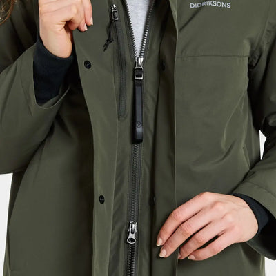Woman in dark olive green waterproof Didriksons Selina Womens Parka for outdoors and country clothing