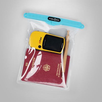 Waterproof Fidlock Maxi Dry Bag with passport, GPS, and pen for all your adventures