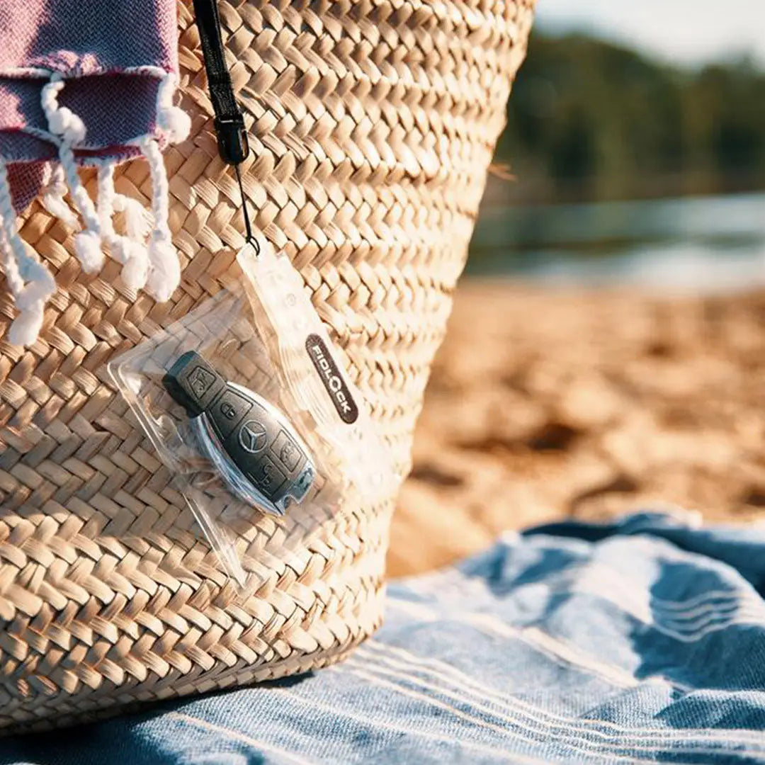 Woven beach bag featuring a waterproof pouch, perfect for Fidlock Mini Dry Bag use