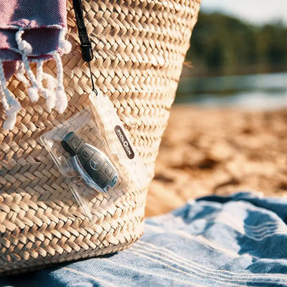 Woven beach bag featuring a waterproof pouch, perfect for Fidlock Mini Dry Bag use