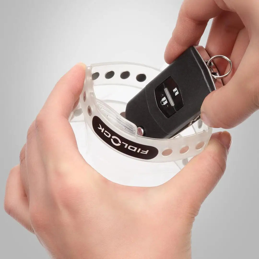 Clear wristband with car key in a Fidlock Mini Dry Bag Transparent for easy access