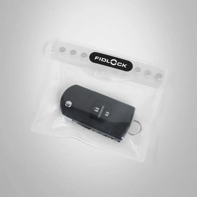 Car key in a Fidlock Mini Dry Bag Transparent for secure storage on the go