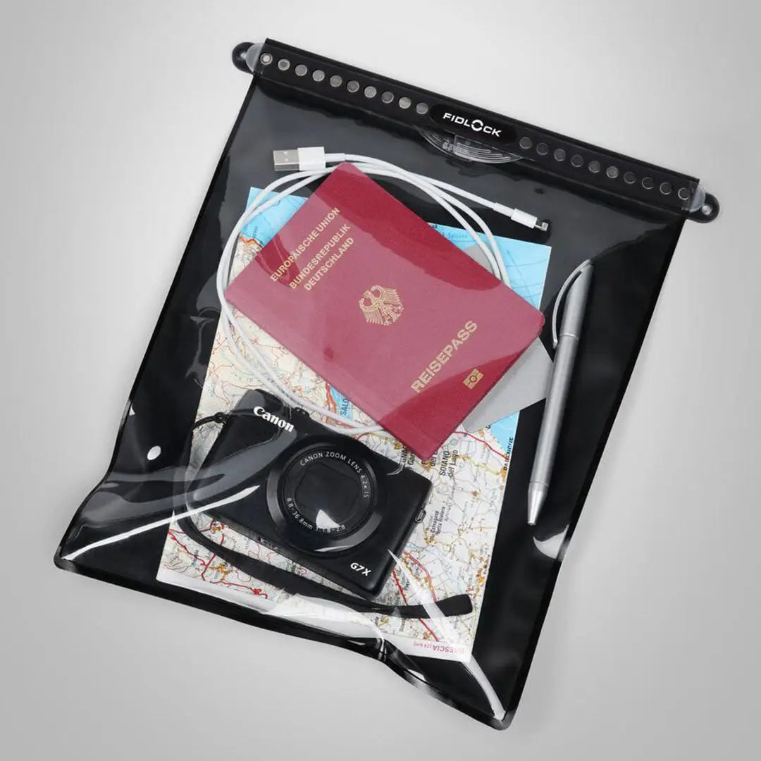 Fidlock Multi Dry Bag with travel essentials for ultimate waterproof protection