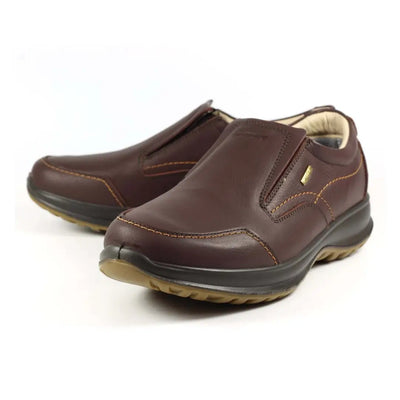 Pair of brown leather Grisport Melrose Active Slip On Shoes with thick soles