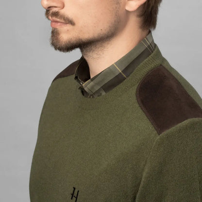 Olive green Härkila Arran Pullover with brown shoulder patches for country hunting style