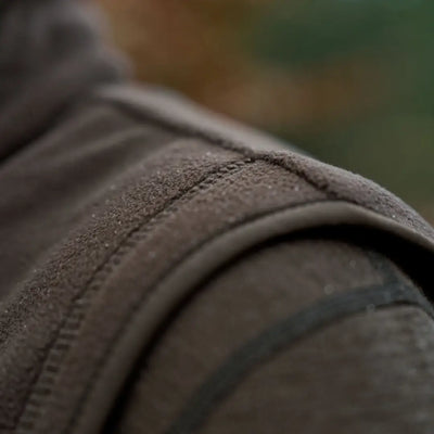 Brown textured shoulder pad on Härkila Aspire Fleece Waistcoat for outdoor style