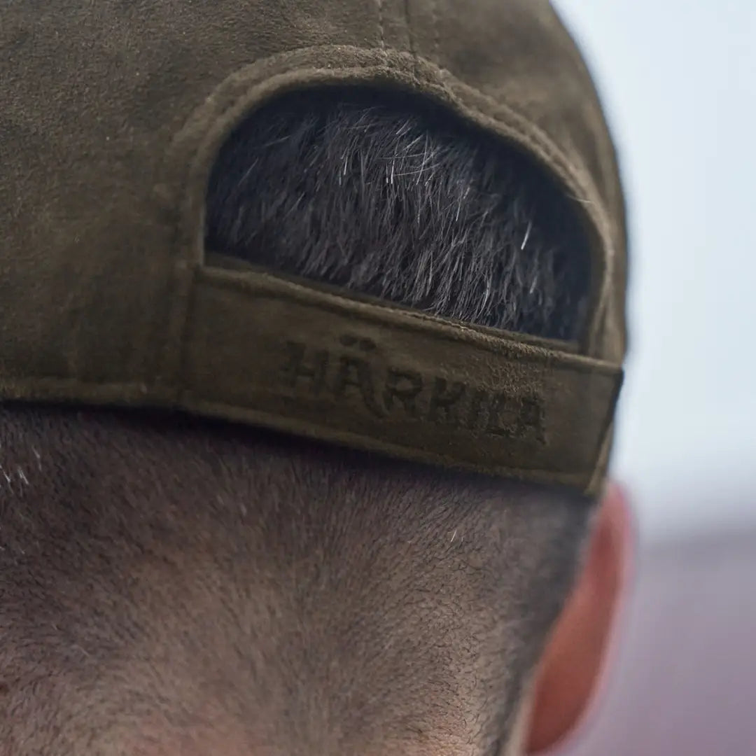 Olive green Härkila Berkshire Cap for country clothing and hunting adventures