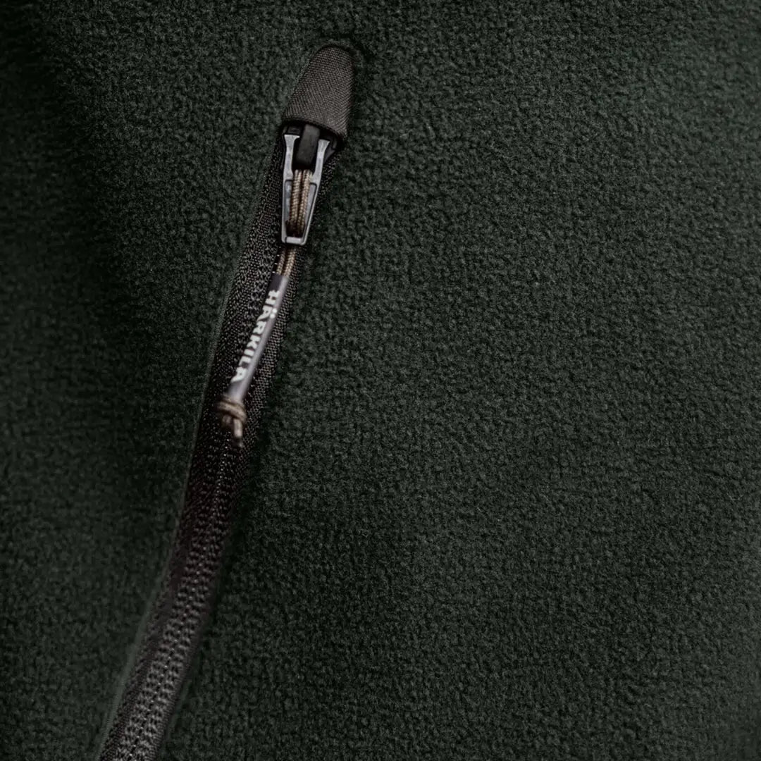 Dark green Härkila Fjell Fleece Jacket with zipper for outdoor adventures