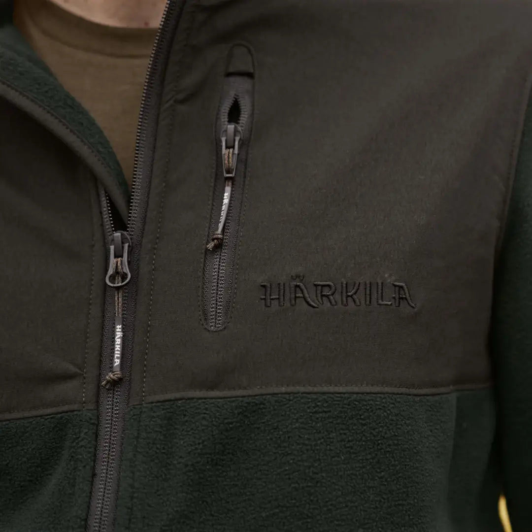 Dark green Härkila Fjell Fleece Jacket shown, perfect as a fjell fleece jacket or fleece jacket option
