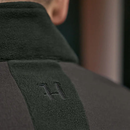 Dark fleece jacket with embroidered logo, perfect for Härkila Fjell Fleece Jacket fans