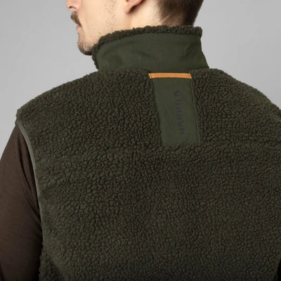Green fleece vest from Härkila Fjell Polar Waistcoat, perfect for outdoor adventures