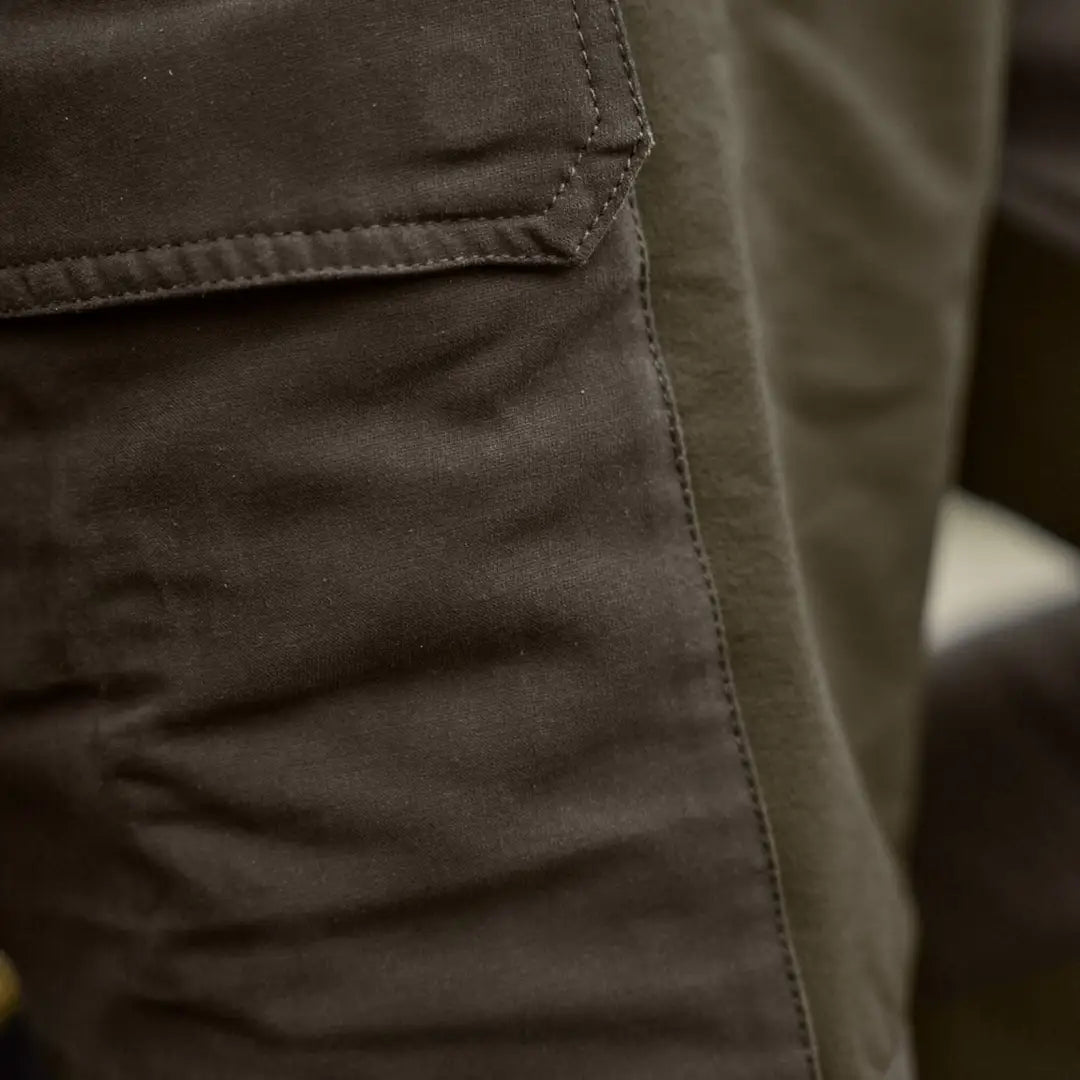 Brown cargo pocket on Härkila Hill Trousers for hunting and country clothing