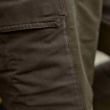 Brown cargo pocket on Härkila Hill Trousers for hunting and country clothing