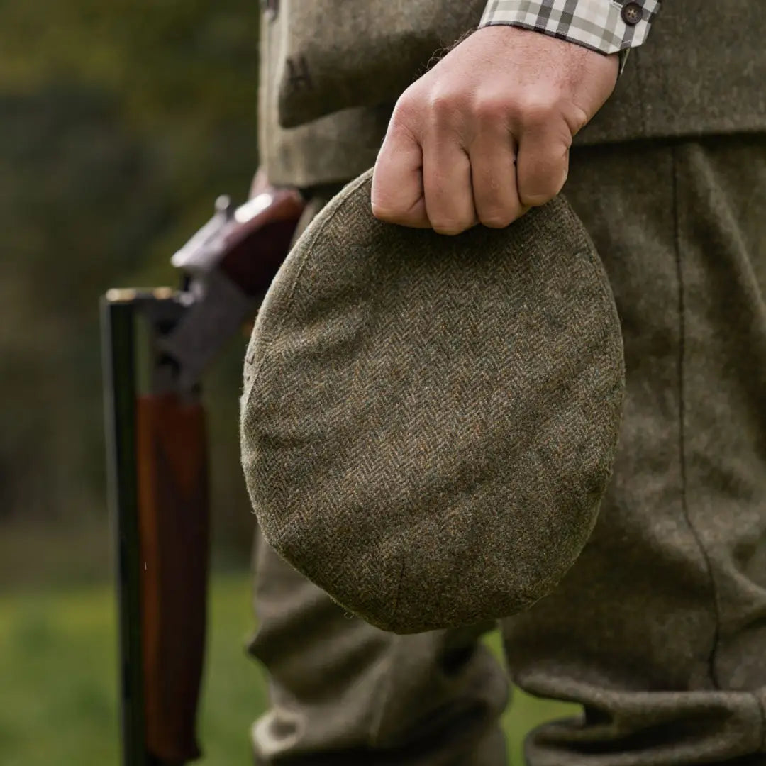 Olive green herringbone flat cap for country clothing and hunting style