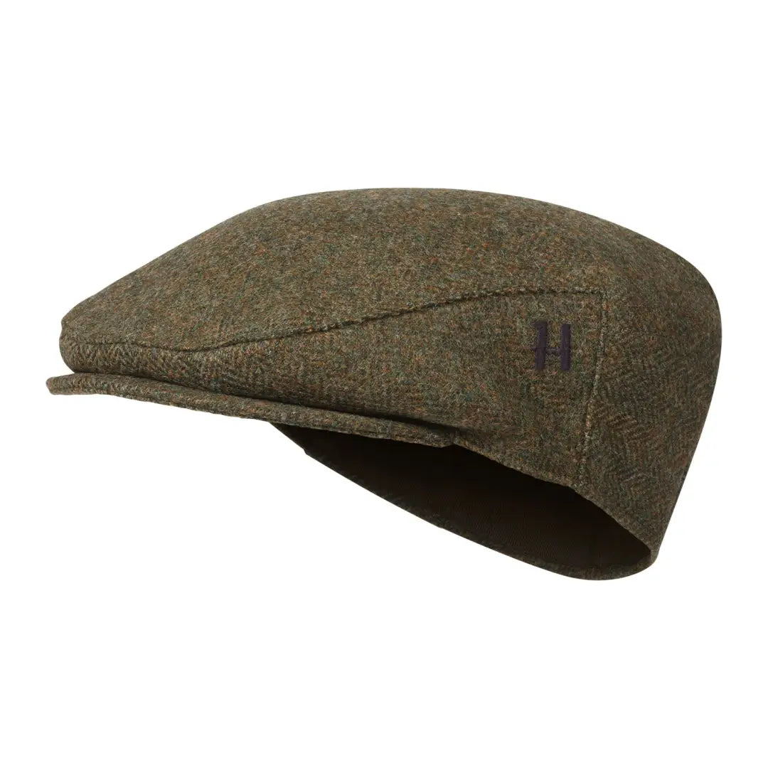 Olive green tweed flat cap from Härkila Kenmore Cl. for country clothing and hunting
