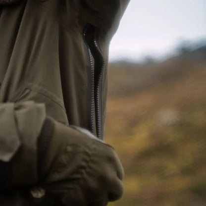 Olive green Härkila Orton Tech packable smock with zipper for country clothing